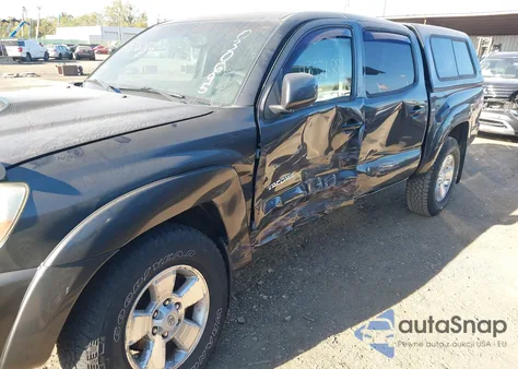 2009 Toyota Tacoma Base V6 из США, поврежденный, VIN 3TMLU42N69M030695